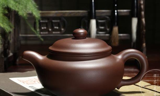 吴志华仿古紫砂壶:扁平端庄大家闺秀,大口盖壶大气十足