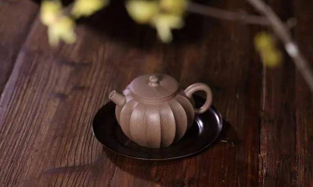 为何用紫砂壶泡茶更显优势?