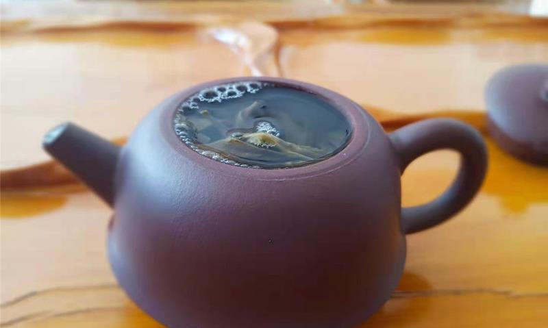 紫砂小知识：紫砂壶开壶后，表面一层白的？