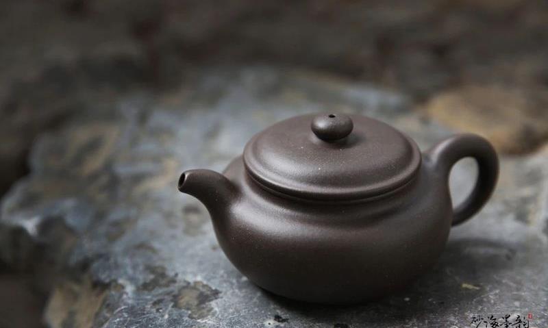 如何判断这把壶是不是真紫砂?